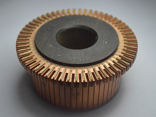 Groove commutator