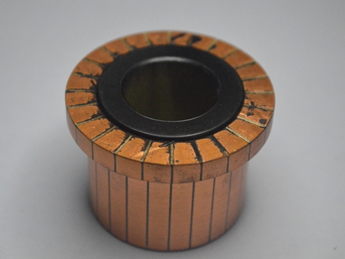Groove commutator