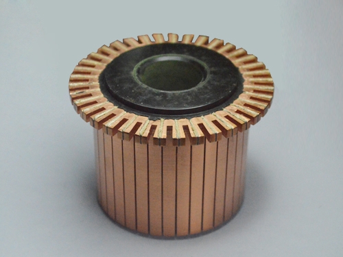 Groove commutator